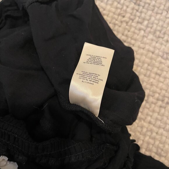 Anthropologie Lilka Pom-Trimmed Off-The-Shoulder Romper - Picture 9 of 10